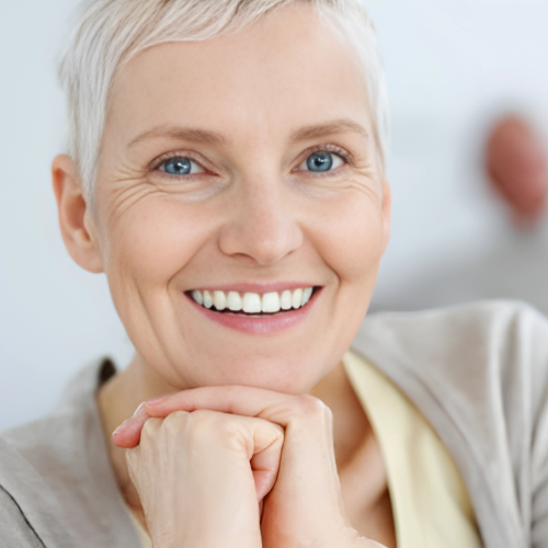 Smiling elderly woman with dentures